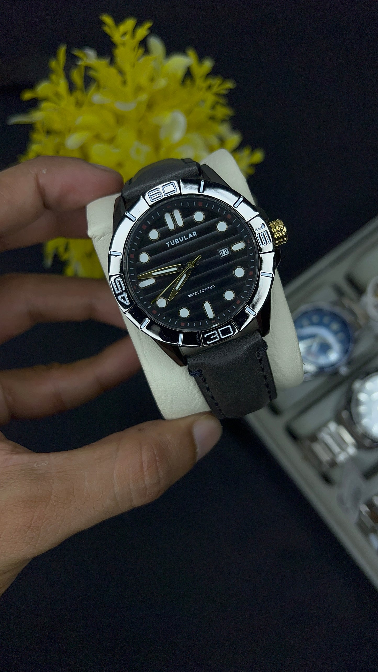 Tubular hand watch